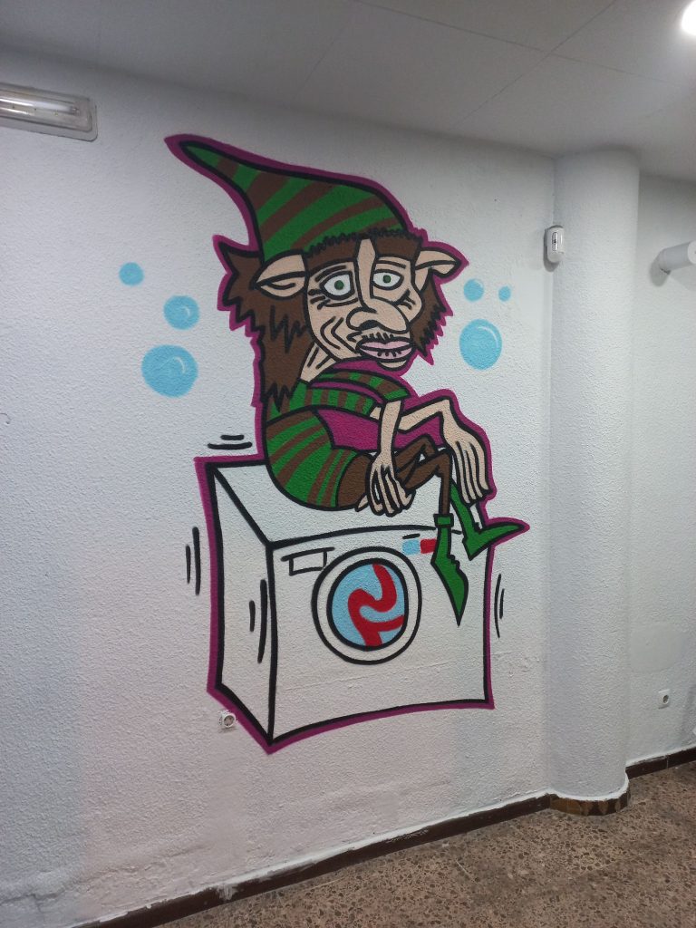 graffiti de dibujo de logotipo en interior de auto lavandería en Cerdanyola del Vallès Barcelona