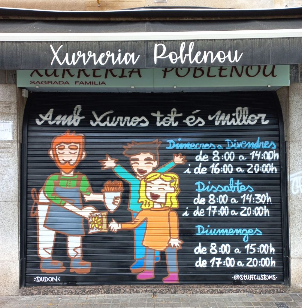 Graffiti en persiana metálica estándar para negocio en Poblenou, Barcelona